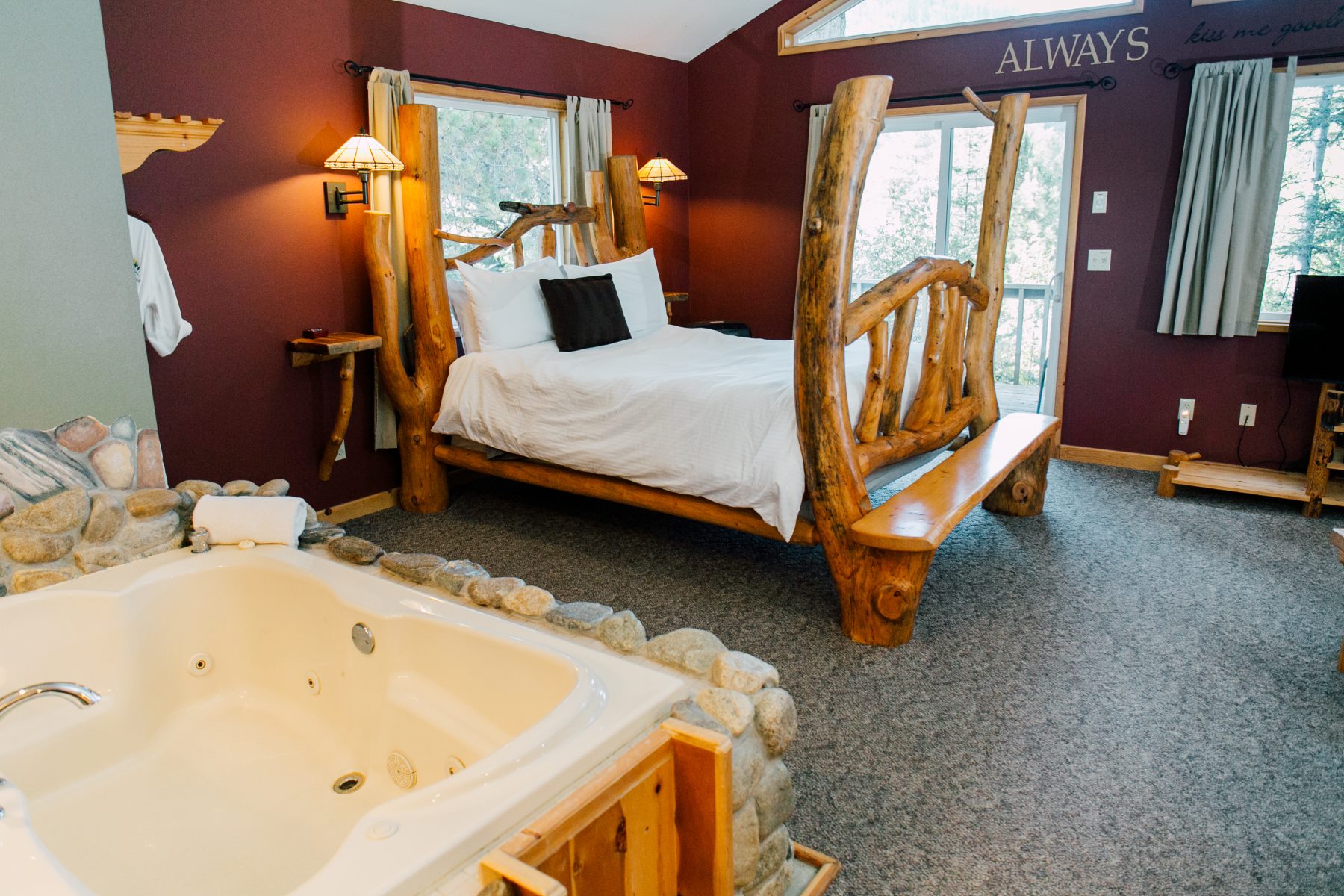 Bed in the Nason Suite at Pine River Ranch