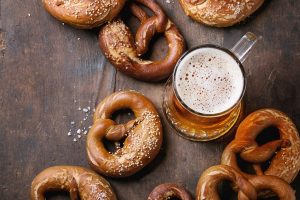 beer in stein with pretzels